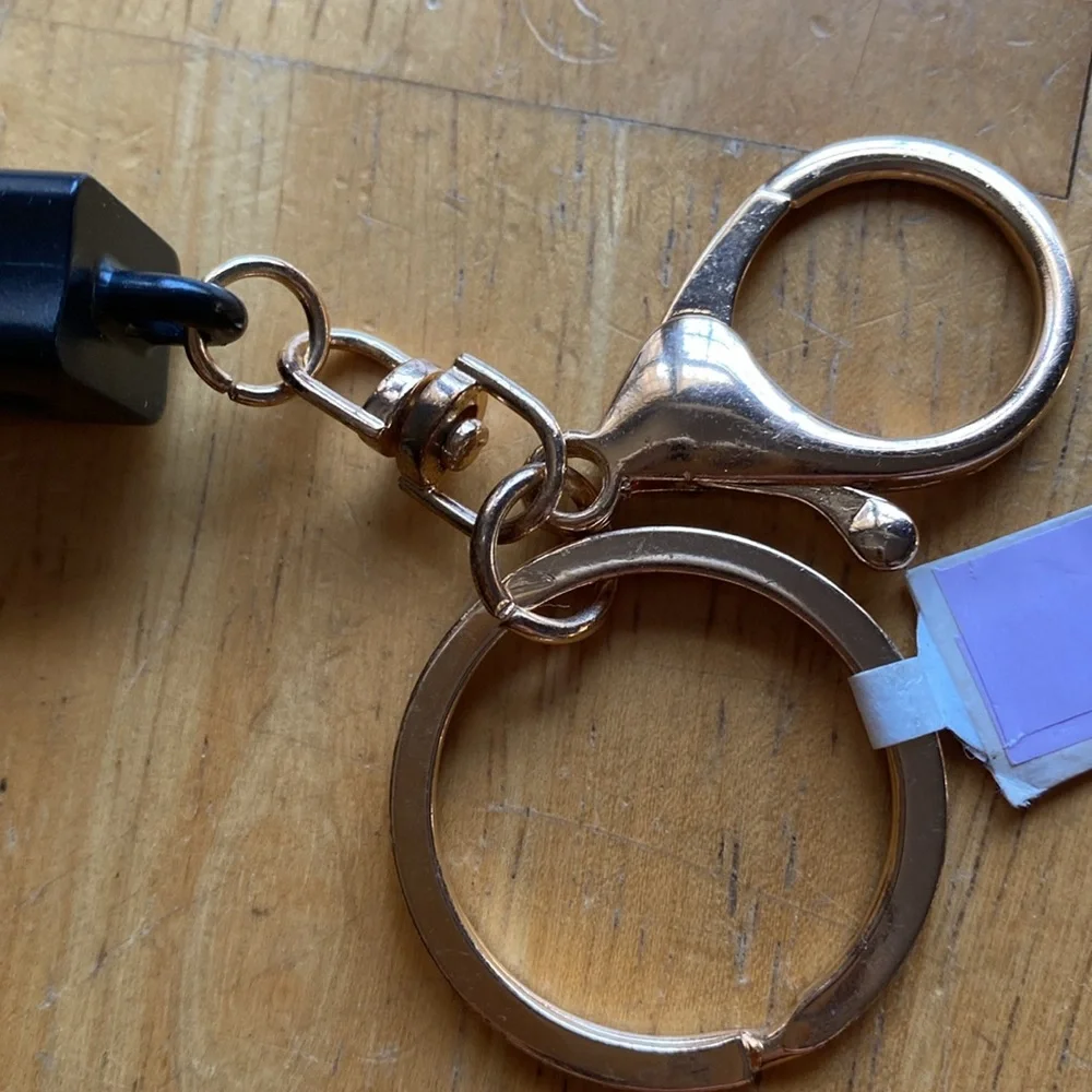 Smartphone charging keychain never used untasted